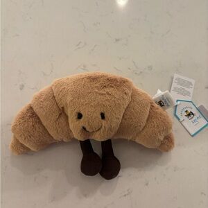 Jellycat Brown Croissant Plush with Dark Brown Legs